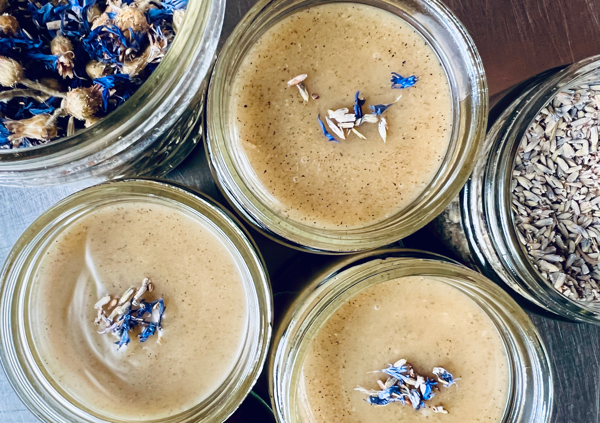 Glass jars containing Ashwagandha, Lavender, and Vanilla: The Dreamiest Herbal-Infused Ghee Recipe.