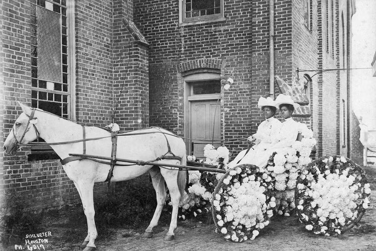 Martha Yates Jones and Pinkie Yates in a flower-adorned buggy, Juneteenth 1908, outside Antioch Baptist Church, Houston, Texas. Photo courtesy of the Reverend Jack Yates Family and Antioch Baptist Church Collection, of the African American History Research Center, Houston Public Library.